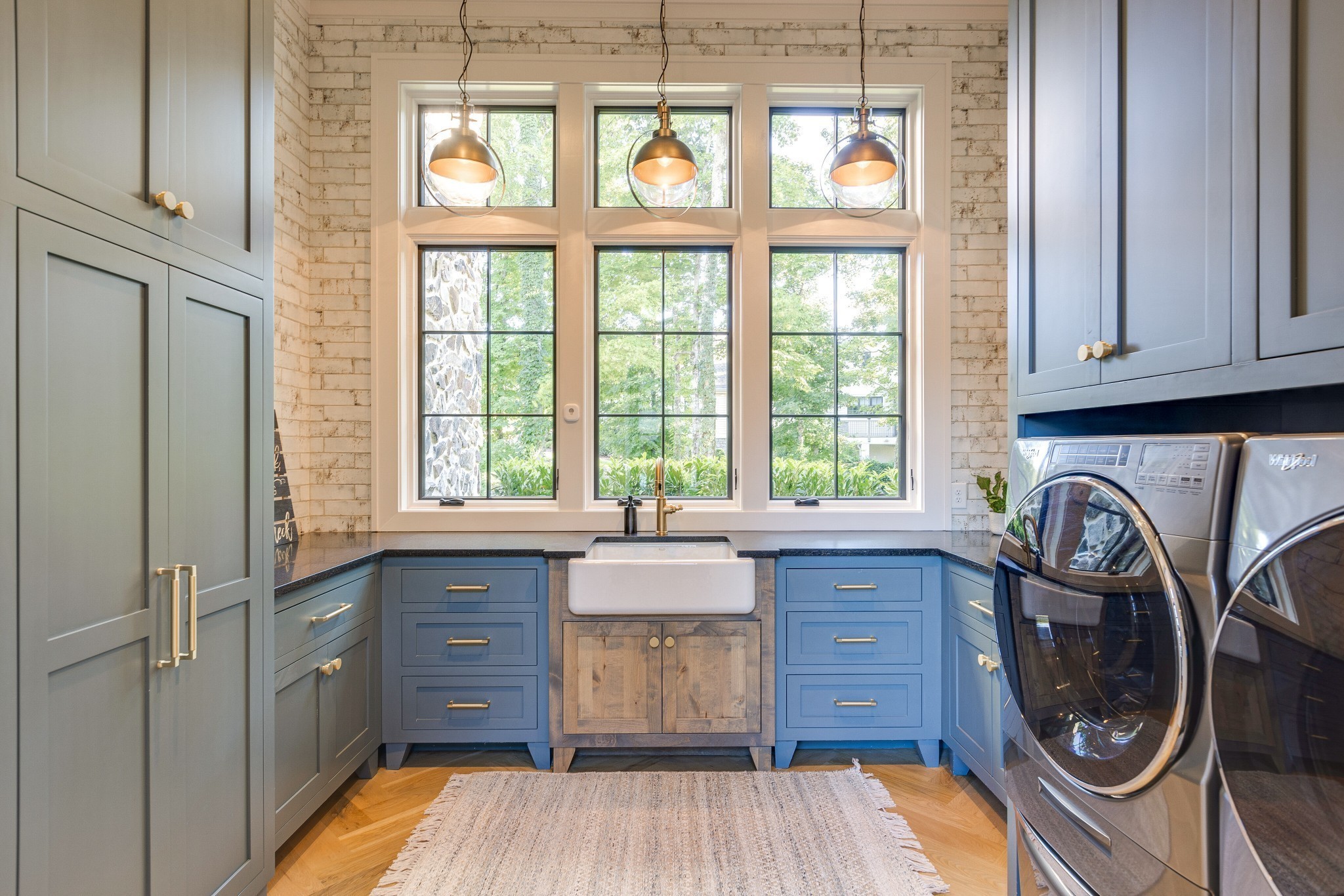 8455 Heirloom Boulevard College Grove, TN 37046 - Photo 63 of 69 a kitchen with wooden floors and sink