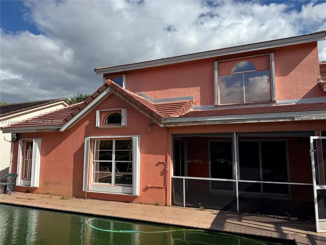 $945,000 | 19720 Northwest 87th Place, Hialeah, FL 33018