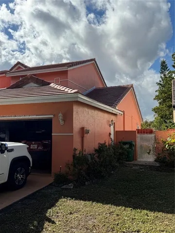 $945,000 | 19720 Northwest 87th Place, Hialeah, FL 33018