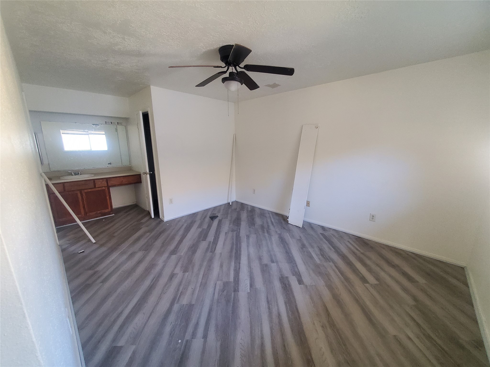 6518 Brookgate Drive Spring, TX 77373 - Photo 11 of 14 a view of empty room with wooden floor