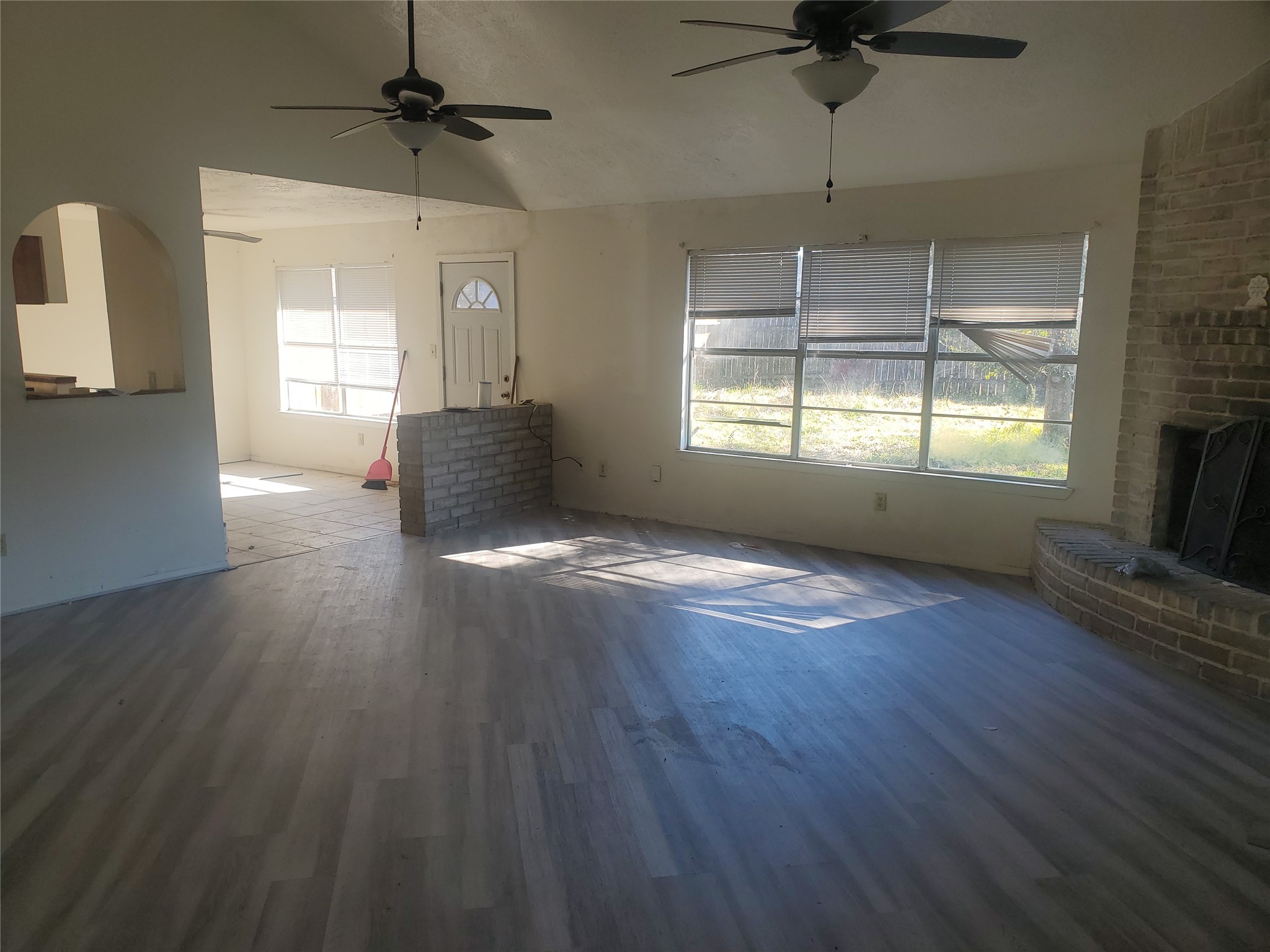 6518 Brookgate Drive Spring, TX 77373 - Photo 4 of 14 a view of empty room with wooden floor and fan