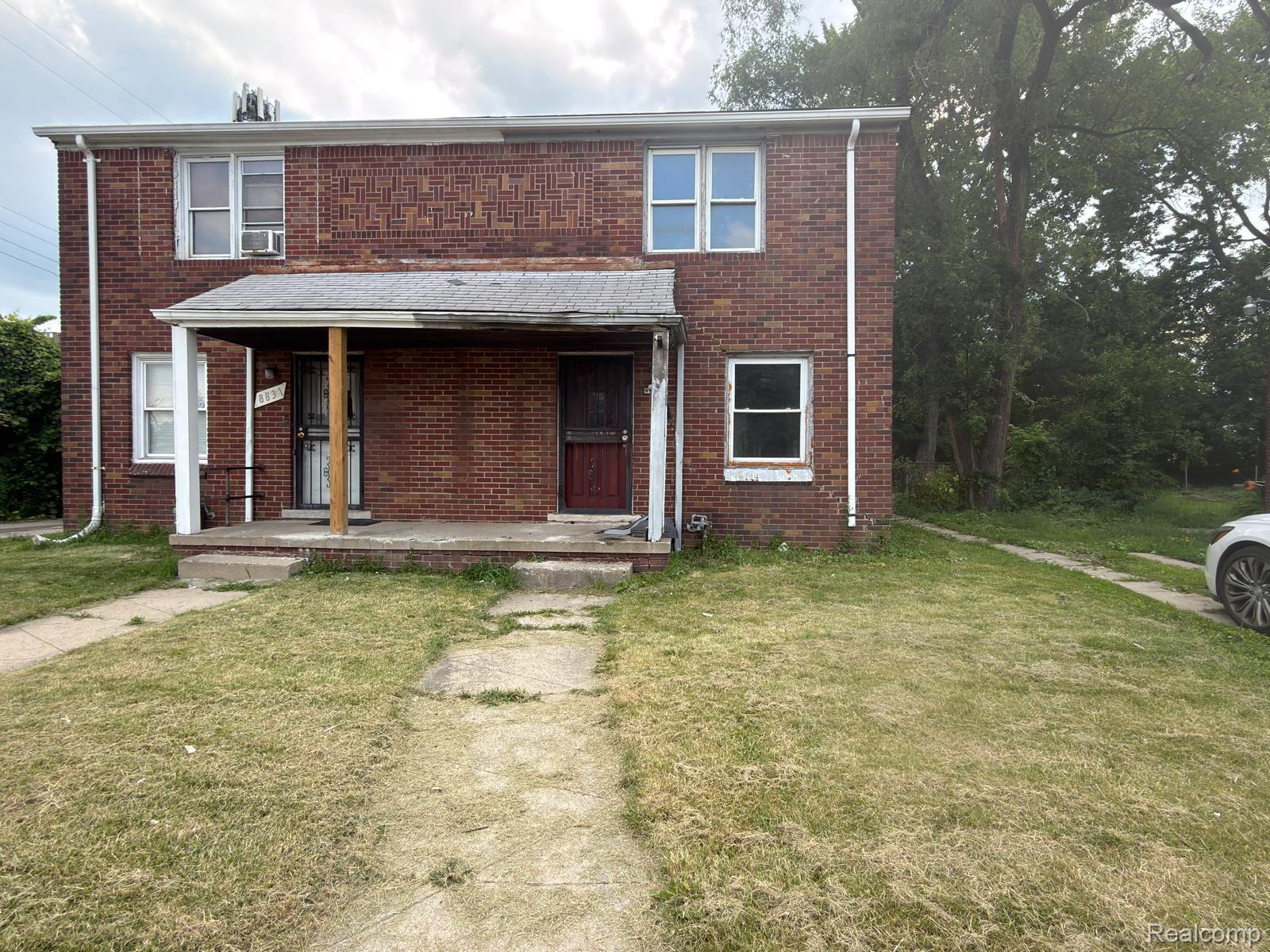 8837 Evergreen Road Detroit, MI 48228 - Photo 1 of 16 Brick duplex structure with two distinct entryways and two upper-level windows