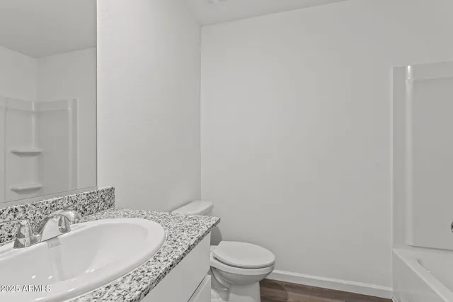 a bathroom with a sink and a toilet