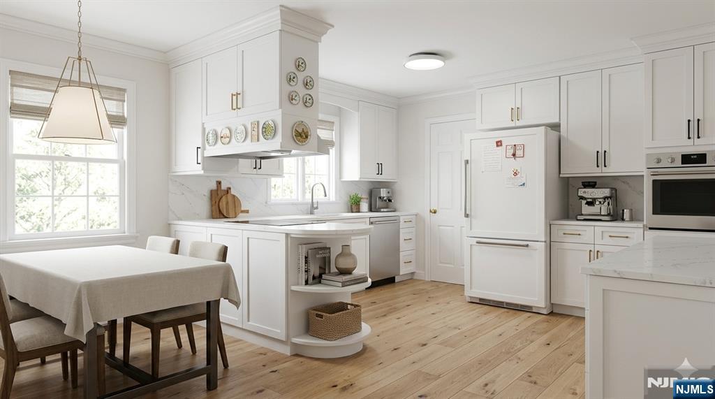 40 Hering Road Montvale, NJ 07645 - Photo 11 of 29 a kitchen with a refrigerator a stove a sink dishwasher and white cabinets with wooden floor