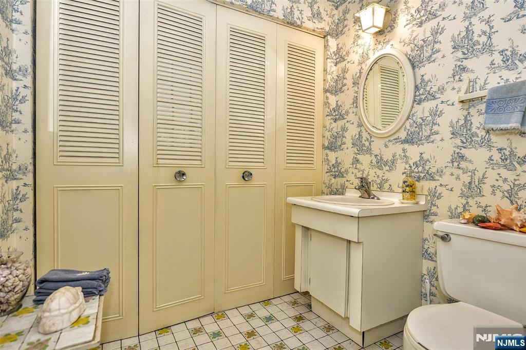 40 Hering Road Montvale, NJ 07645 - Photo 12 of 29 a bathroom with a sink a toilet and shower