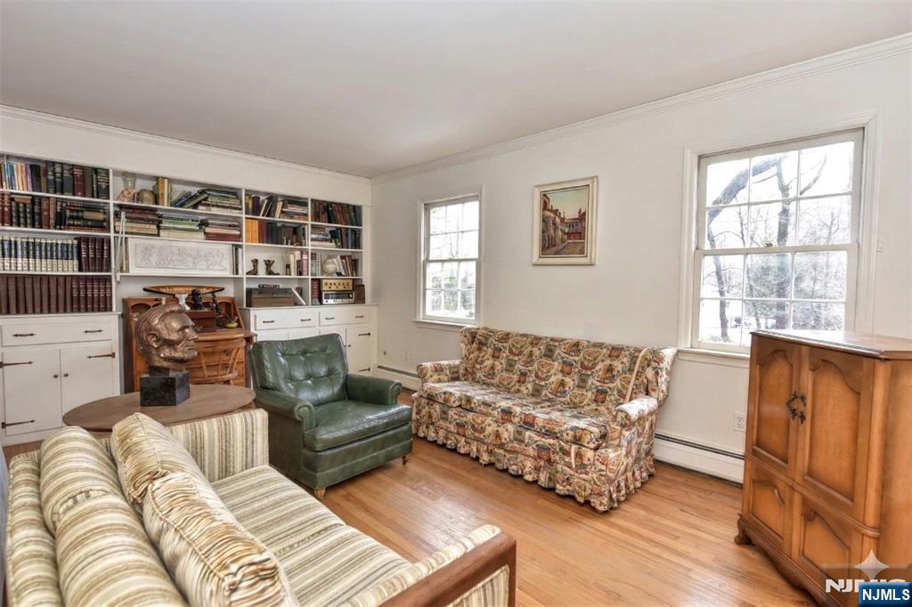 40 Hering Road Montvale, NJ 07645 - Photo 18 of 29 a living room with furniture and a window