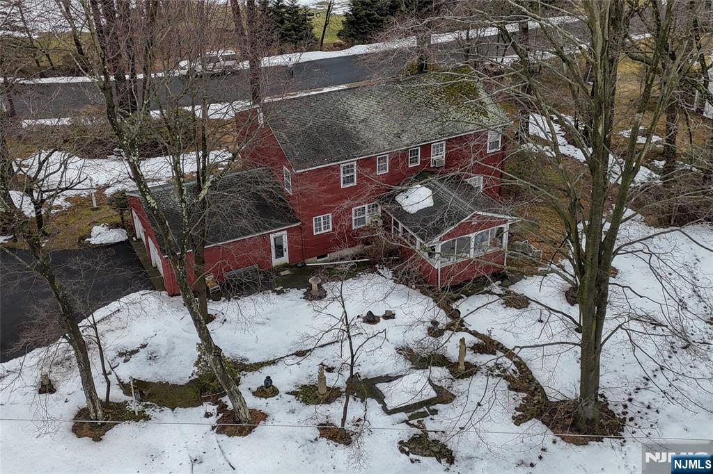 40 Hering Road Montvale, NJ 07645 - Photo 22 of 29 a view of a backyard with a trees