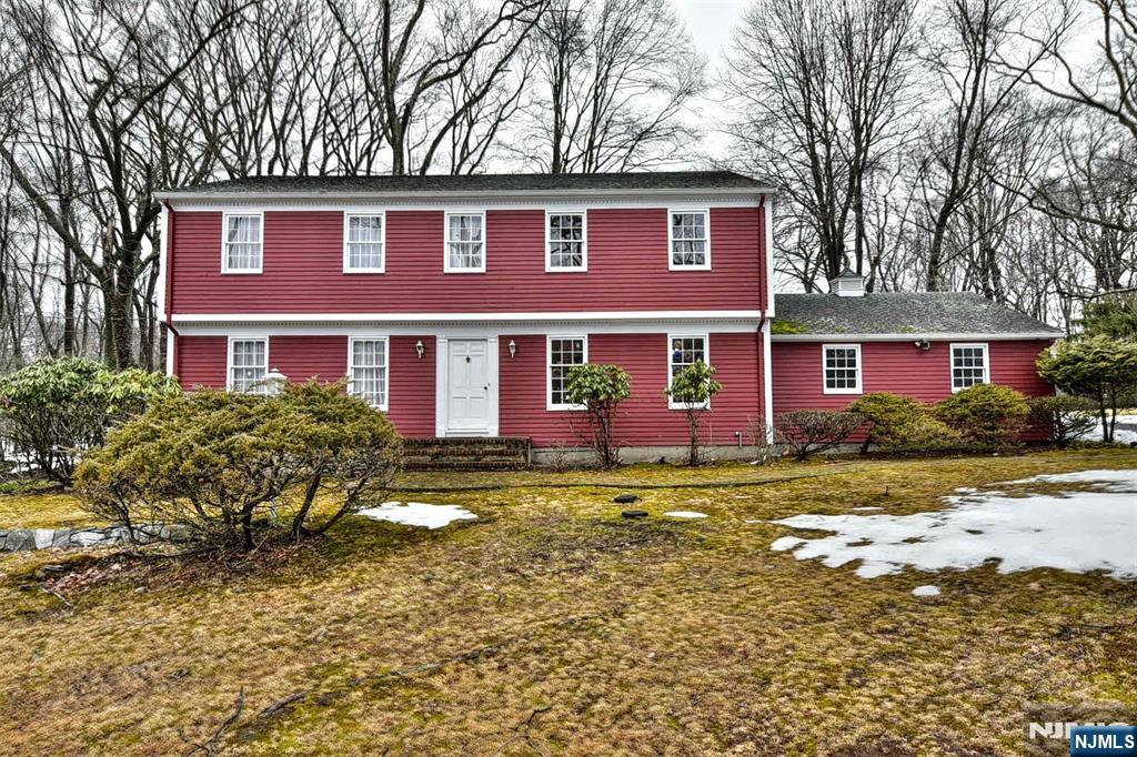 40 Hering Road Montvale, NJ 07645 - Photo 24 of 29 a front view of a house with a yard