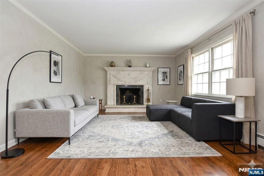 40 Hering Road Montvale, NJ 07645 - Photo 7 of 29 a living room with furniture and a fireplace