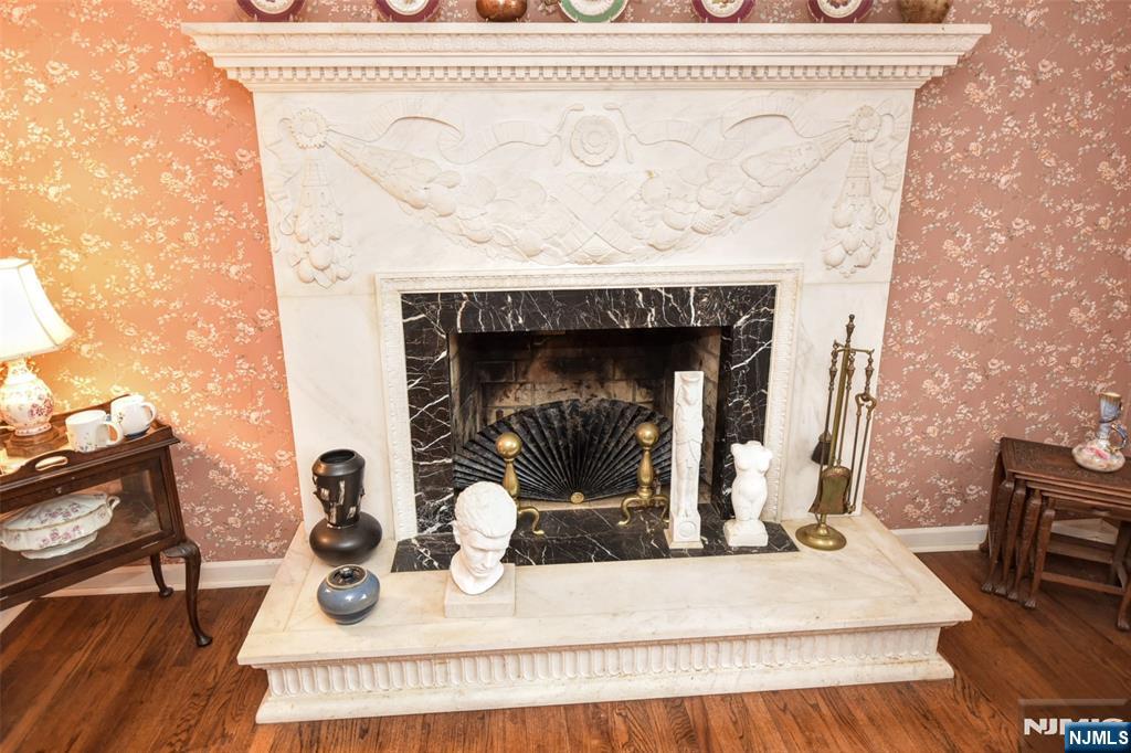 40 Hering Road Montvale, NJ 07645 - Photo 8 of 29 a living room with furniture and a fireplace