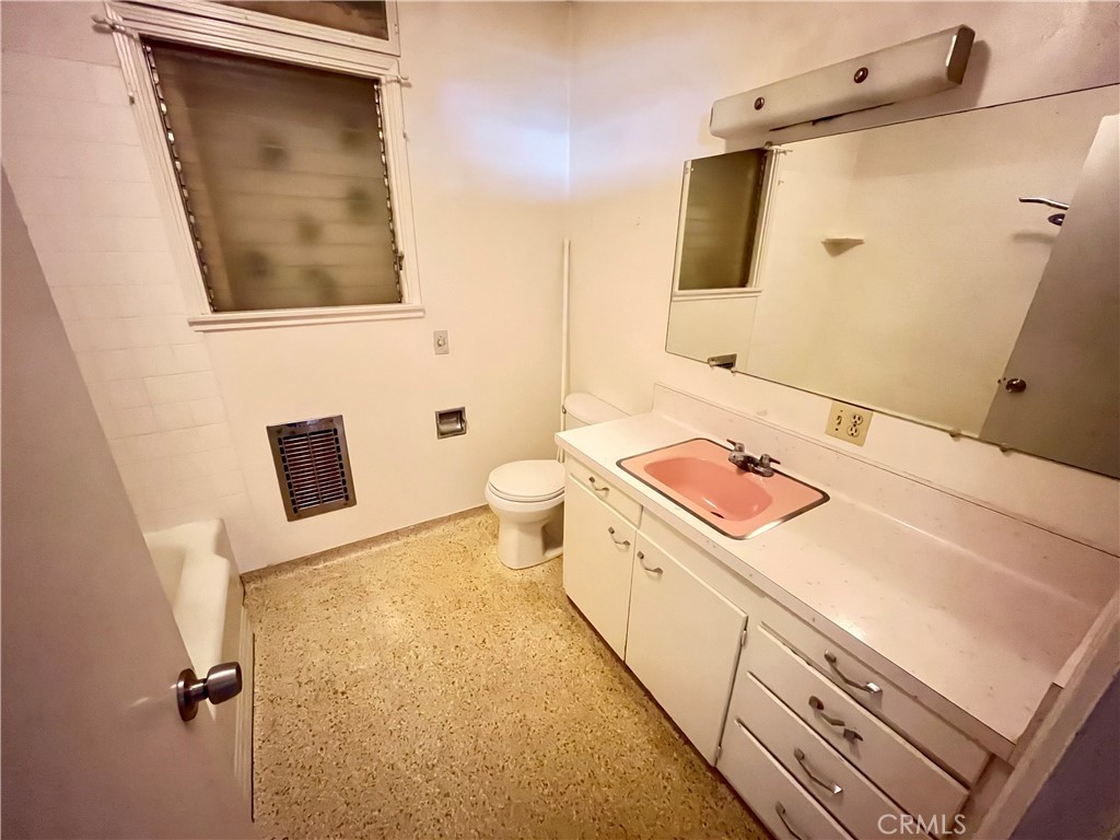 4245-4245 Homewood Court Riverside, CA 92506 - Photo 11 of 15 a bathroom with a sink a toilet and shower