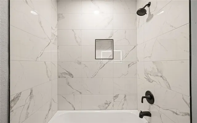 a bathroom with a bathtub