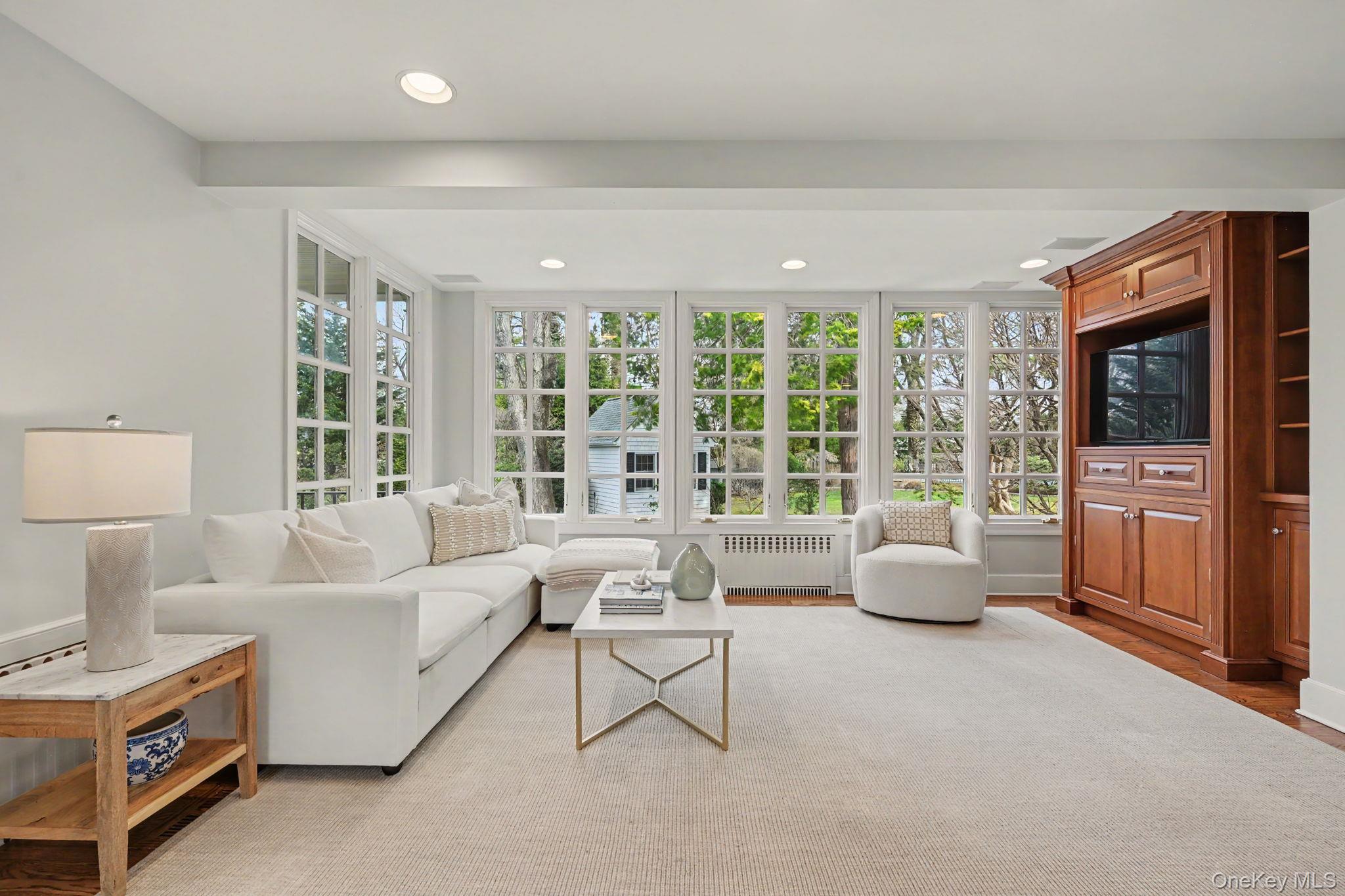 2 Park Drive South Rye, NY 10580 - Photo 12 of 50 a living room with furniture and a large window