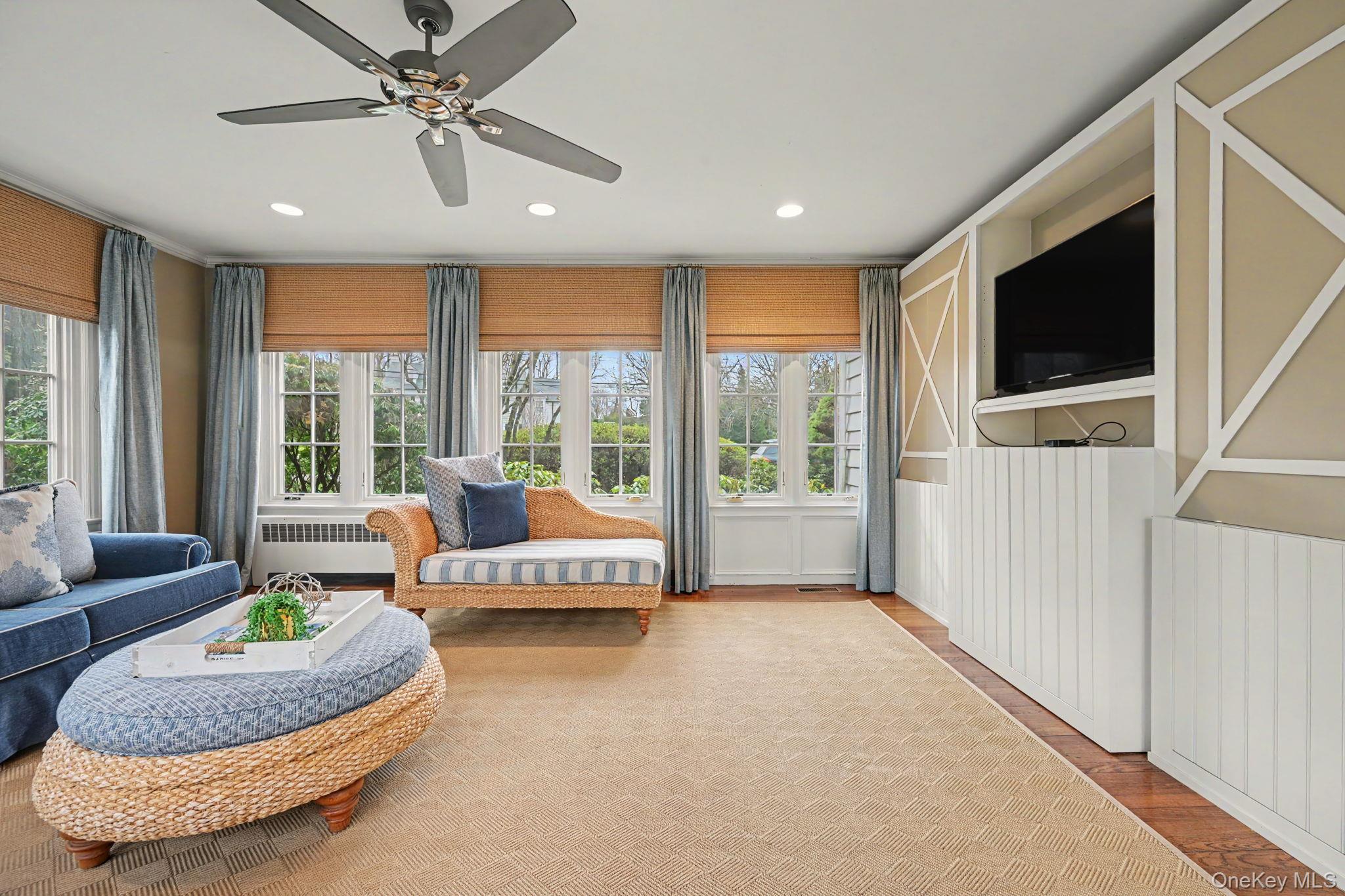 2 Park Drive South Rye, NY 10580 - Photo 15 of 50 a living room with furniture and a large window