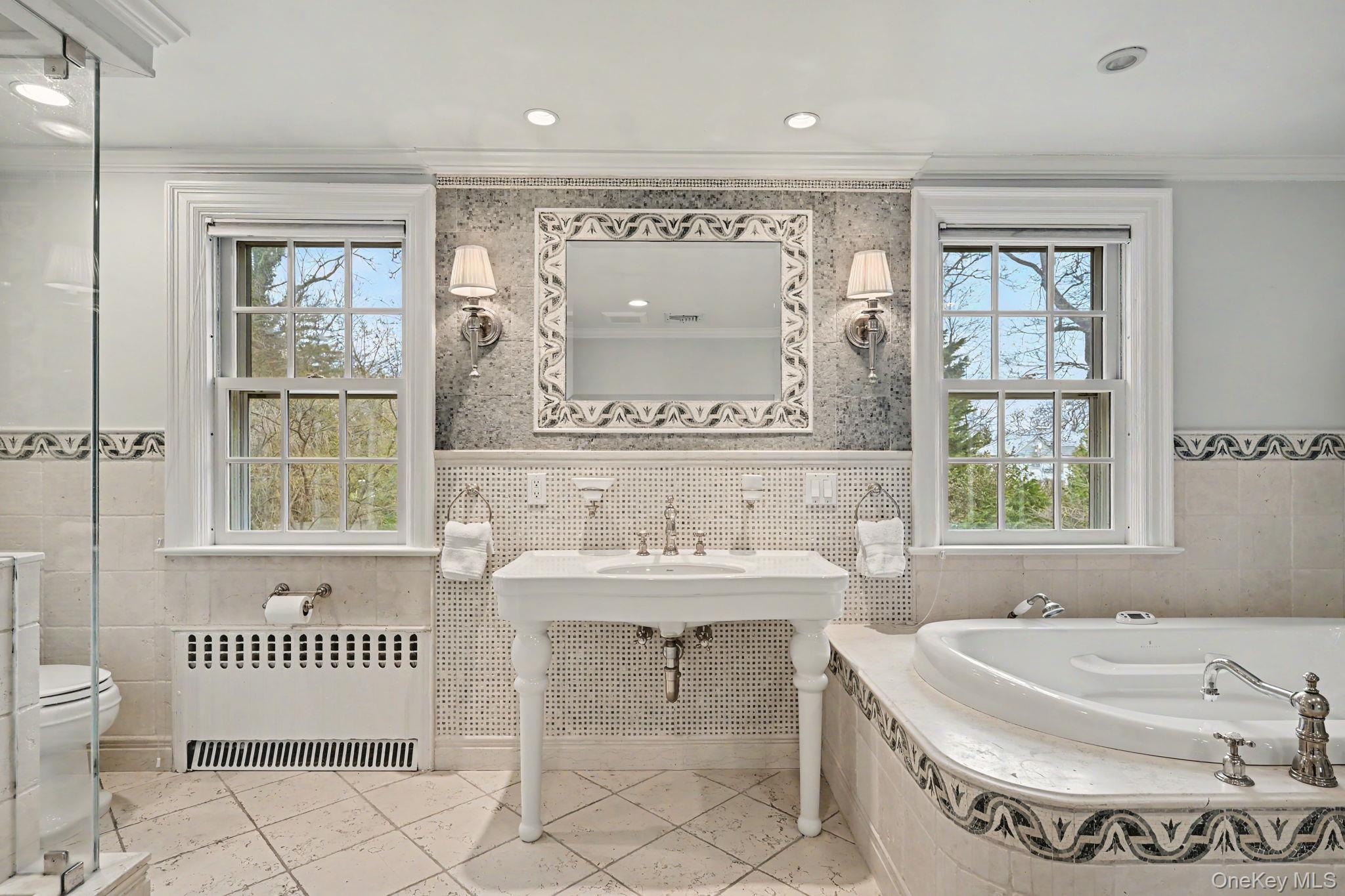 2 Park Drive South Rye, NY 10580 - Photo 26 of 50 a bathroom with a bathtub and a sink