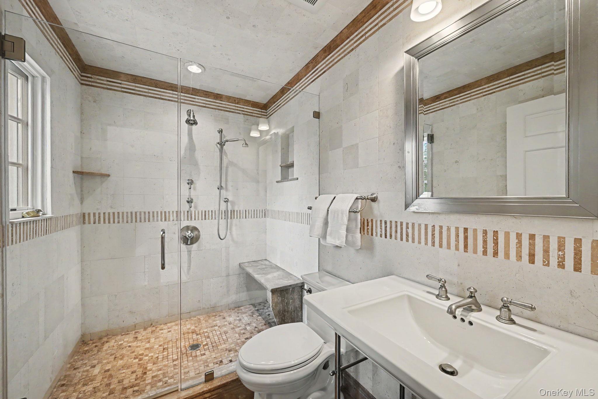 2 Park Drive South Rye, NY 10580 - Photo 31 of 50 a bathroom with a sink toilet and shower