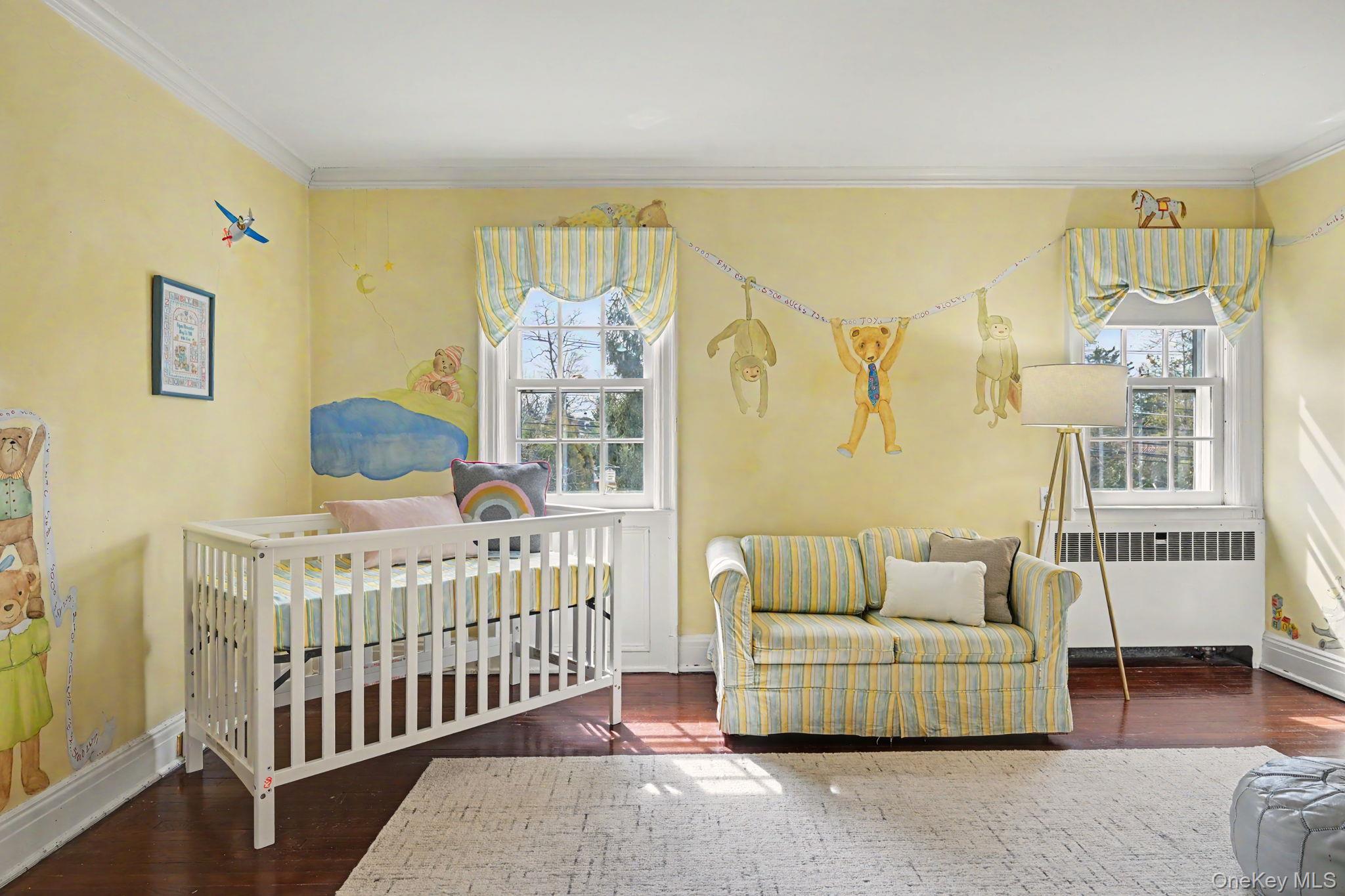 2 Park Drive South Rye, NY 10580 - Photo 32 of 50 a bedroom with a bed and wooden floor