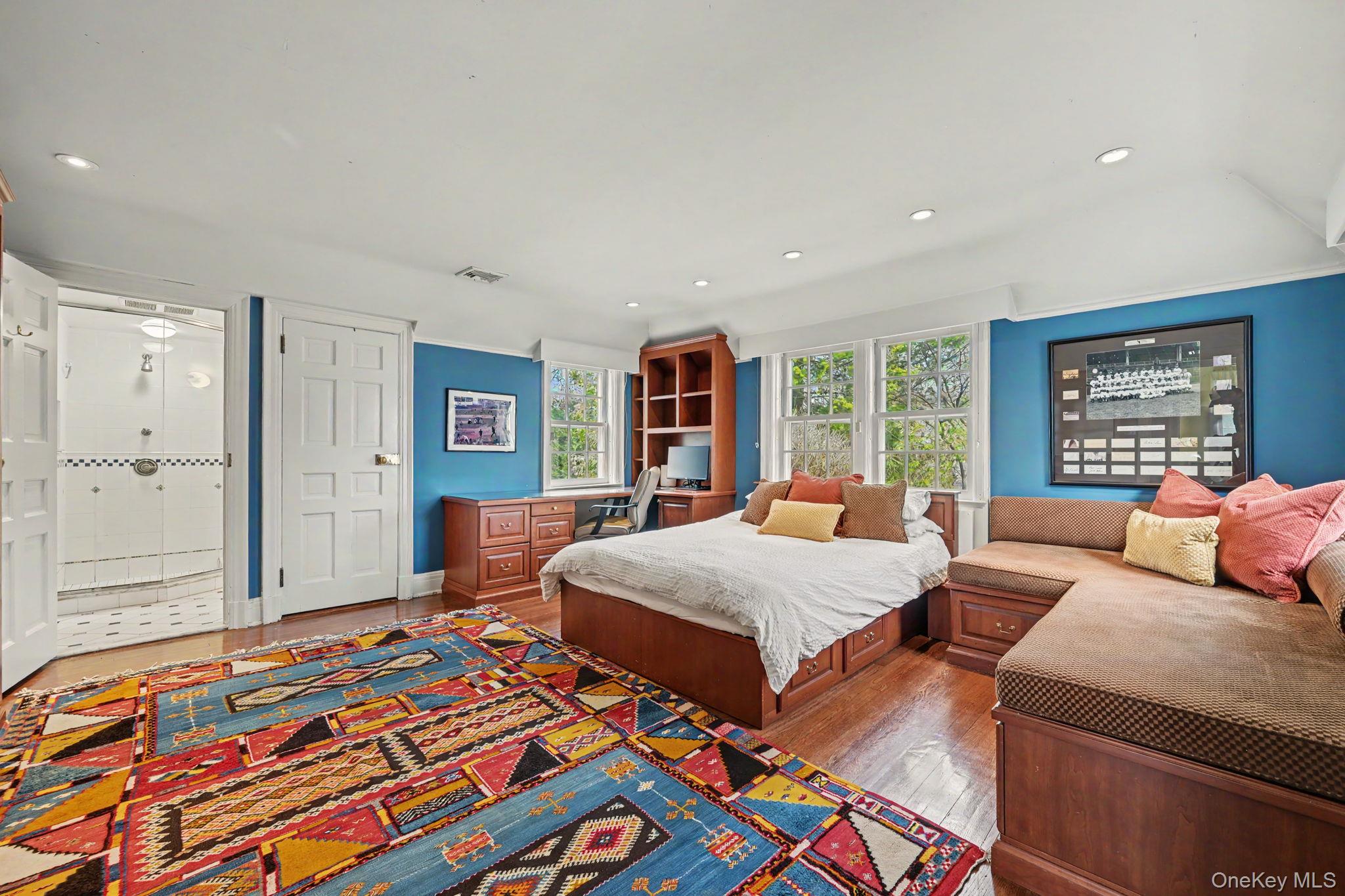 2 Park Drive South Rye, NY 10580 - Photo 34 of 50 a bedroom with two beds and a large window