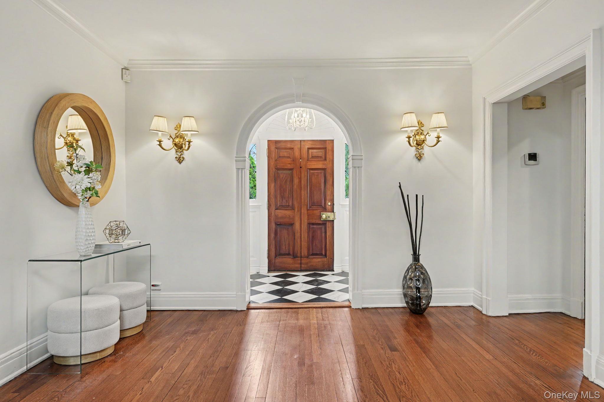 2 Park Drive South Rye, NY 10580 - Photo 4 of 50 a view of a hallway with wooden floor and a dining space area