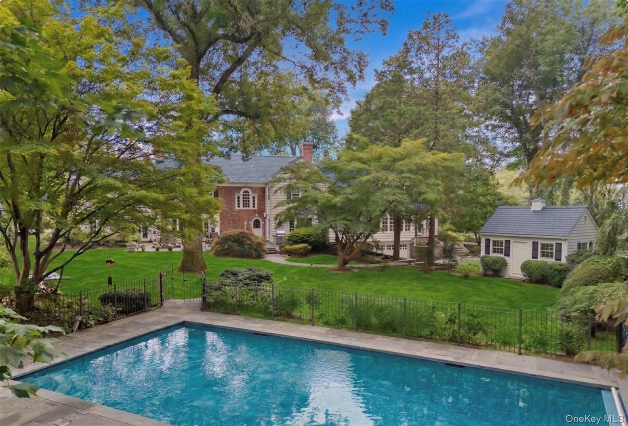 2 Park Drive South Rye, NY 10580 - Photo 4 of 6 A private oasis featuring pool and expansive grounds.Virtually enhanced grass.