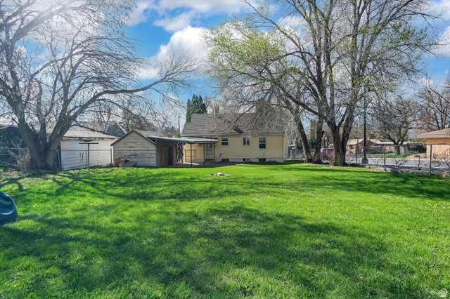 744 North 500 East Logan, UT 84321 - Photo 29 of 29 Rear view of property with a patio and a fenced backyard