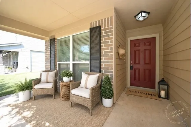 a kitchen with stainless steel appliances kitchen island granite countertop a stove refrigerator and microwave