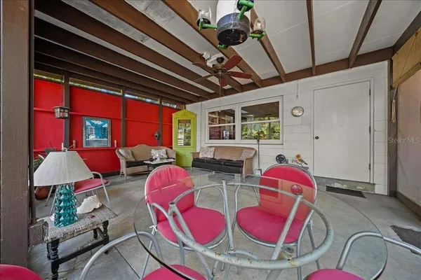 an aerial view of a house with outdoor space