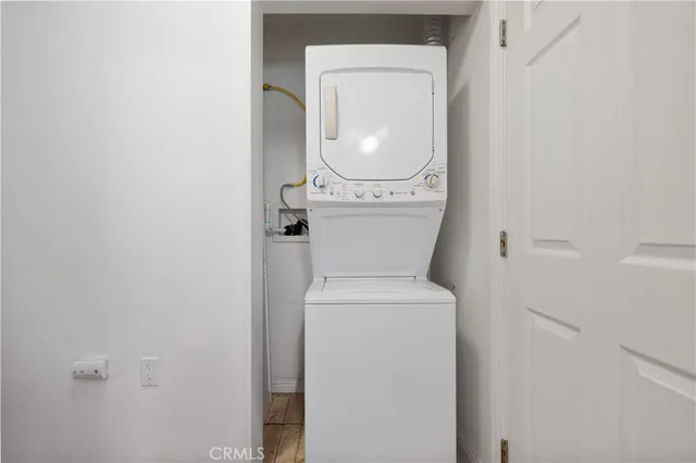 a close view of a utility room with a washer and dryer
