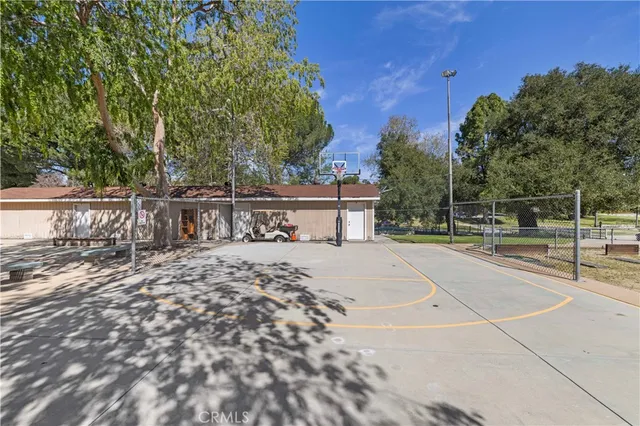 a view of a backyard with sitting area