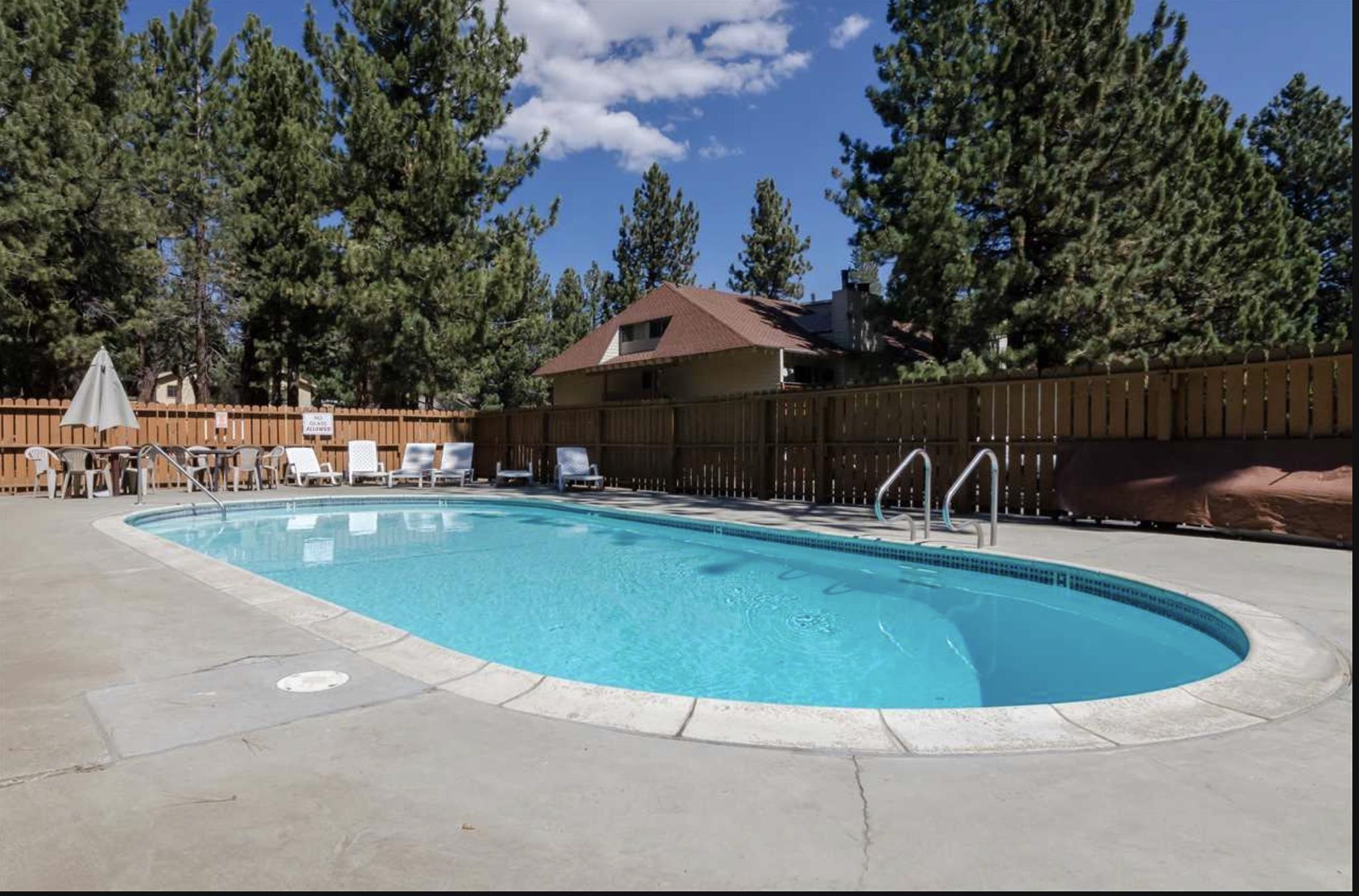 2499 Sierra Nevada Road, Unit R2 Mammoth Lakes, CA 93546 - Photo 22 of 26 a view of a swimming pool with a patio