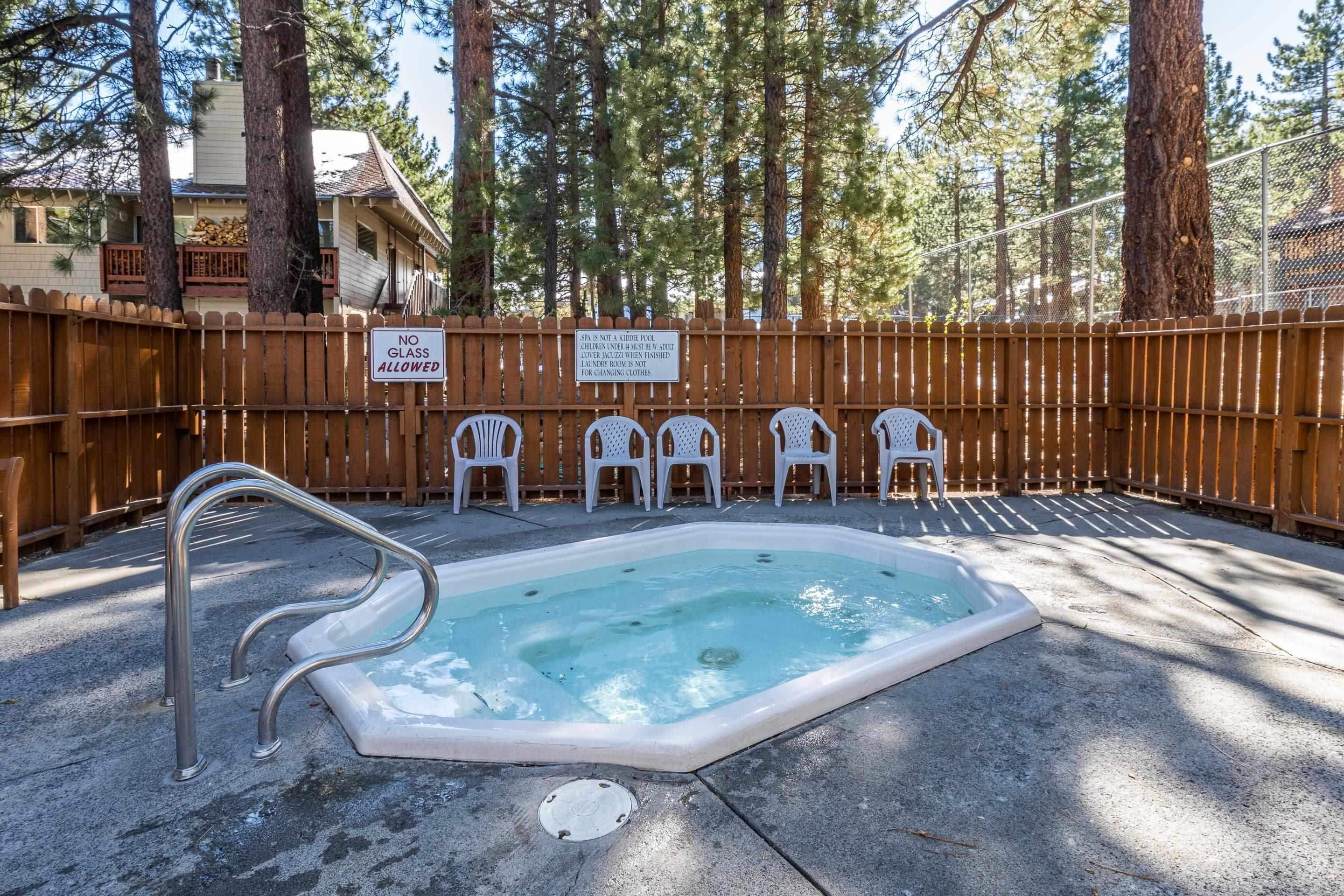 2499 Sierra Nevada Road, Unit R2 Mammoth Lakes, CA 93546 - Photo 23 of 26 a view of a swimming pool with a sitting space