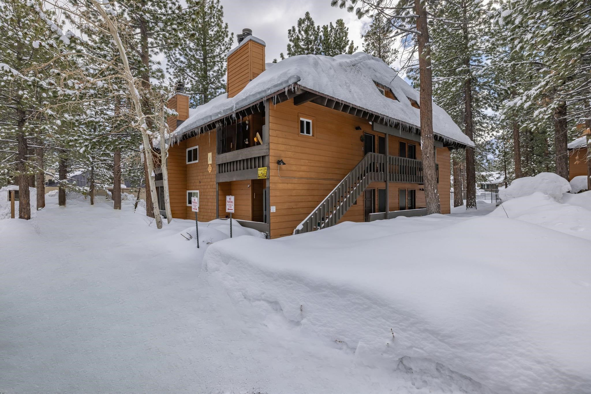 2499 Sierra Nevada Road, Unit R2 Mammoth Lakes, CA 93546 - Photo 5 of 26 a view of a house with a wooden wall