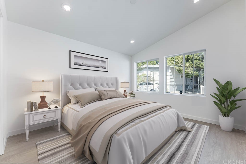 1177 Aztec Topanga, CA 90290 - Photo 22 of 65 a bedroom with bed and a large window