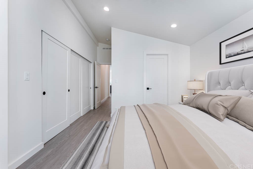 1177 Aztec Topanga, CA 90290 - Photo 24 of 65 a bedroom with a bed and closet
