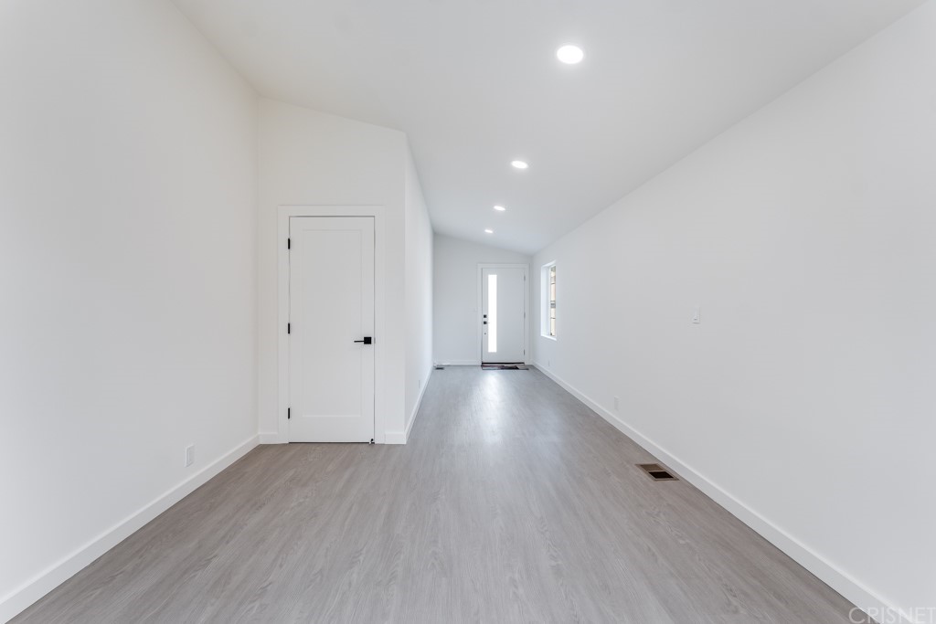 1177 Aztec Topanga, CA 90290 - Photo 5 of 65 a view of a room with wooden floor and window