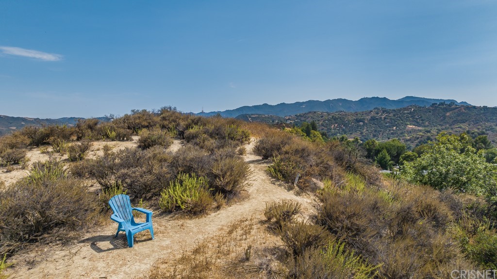 1177 Aztec Topanga, CA 90290 - Photo 58 of 65 a view of a mountain with a tree in the background