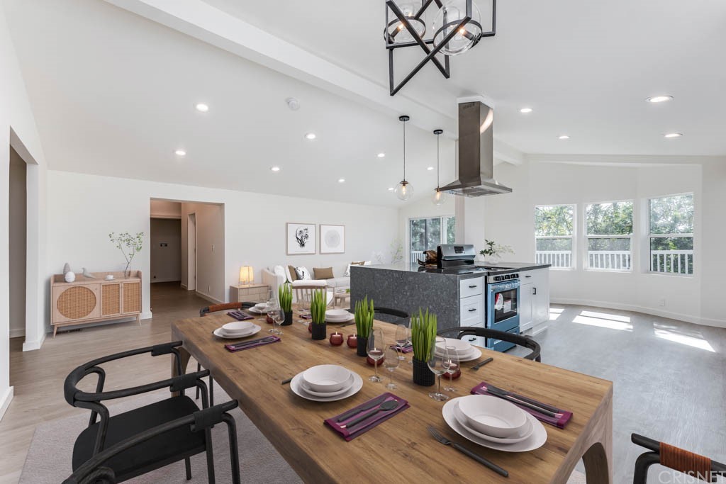 1177 Aztec Topanga, CA 90290 - Photo 9 of 65 a view of a dining room with furniture a chandelier and wooden floor