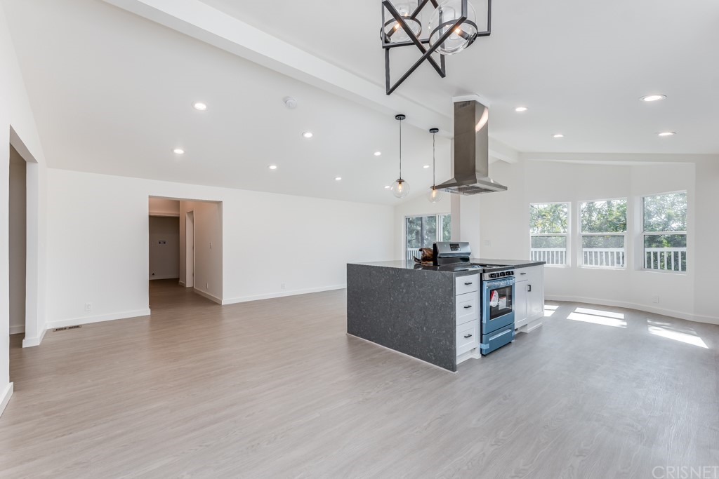 1177 Aztec Topanga, CA 90290 - Photo 10 of 65 a view of a kitchen with a sink and a chandelier