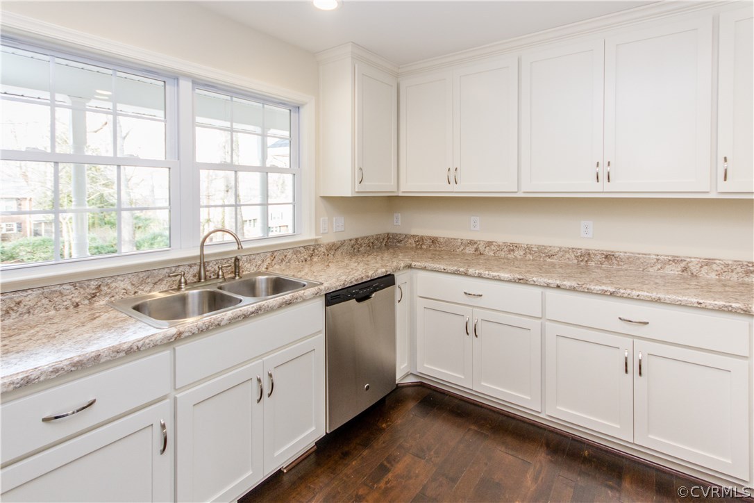11425 Surry Road Chester, VA 23831 - Photo 2 of 33 a kitchen with granite countertop white cabinets and white appliances