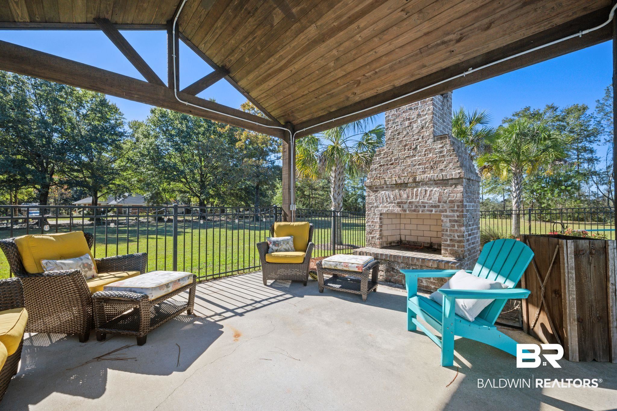 38211-d) V R Byrd Road Bay Minette, AL 36507 - Photo 34 of 58 View of patio / terrace featuring an outdoor brick fireplace