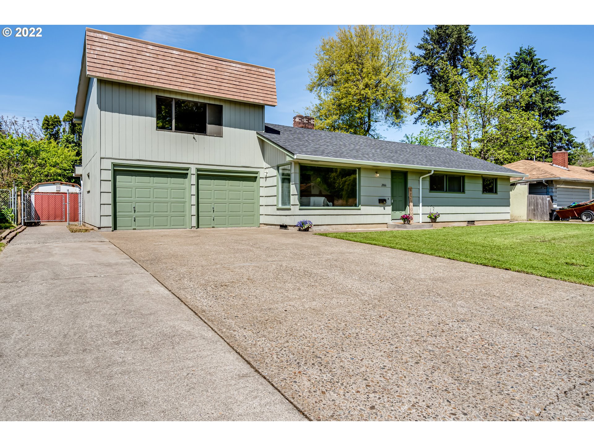 2866 Manor Drive Springfield, OR 97477 - Photo 3 of 32 a view of a house with a yard and sitting area