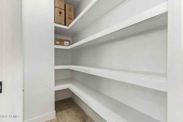 a view of an empty walk in closet