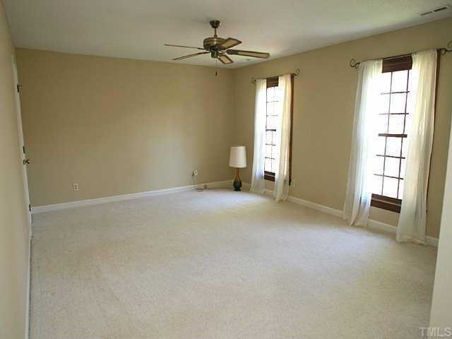11808 Coachmans Way Raleigh, NC 27614 - Photo 6 of 12 Master bedroom has two tall windows with adjoining bath and walk-in closet. Master Bedroom