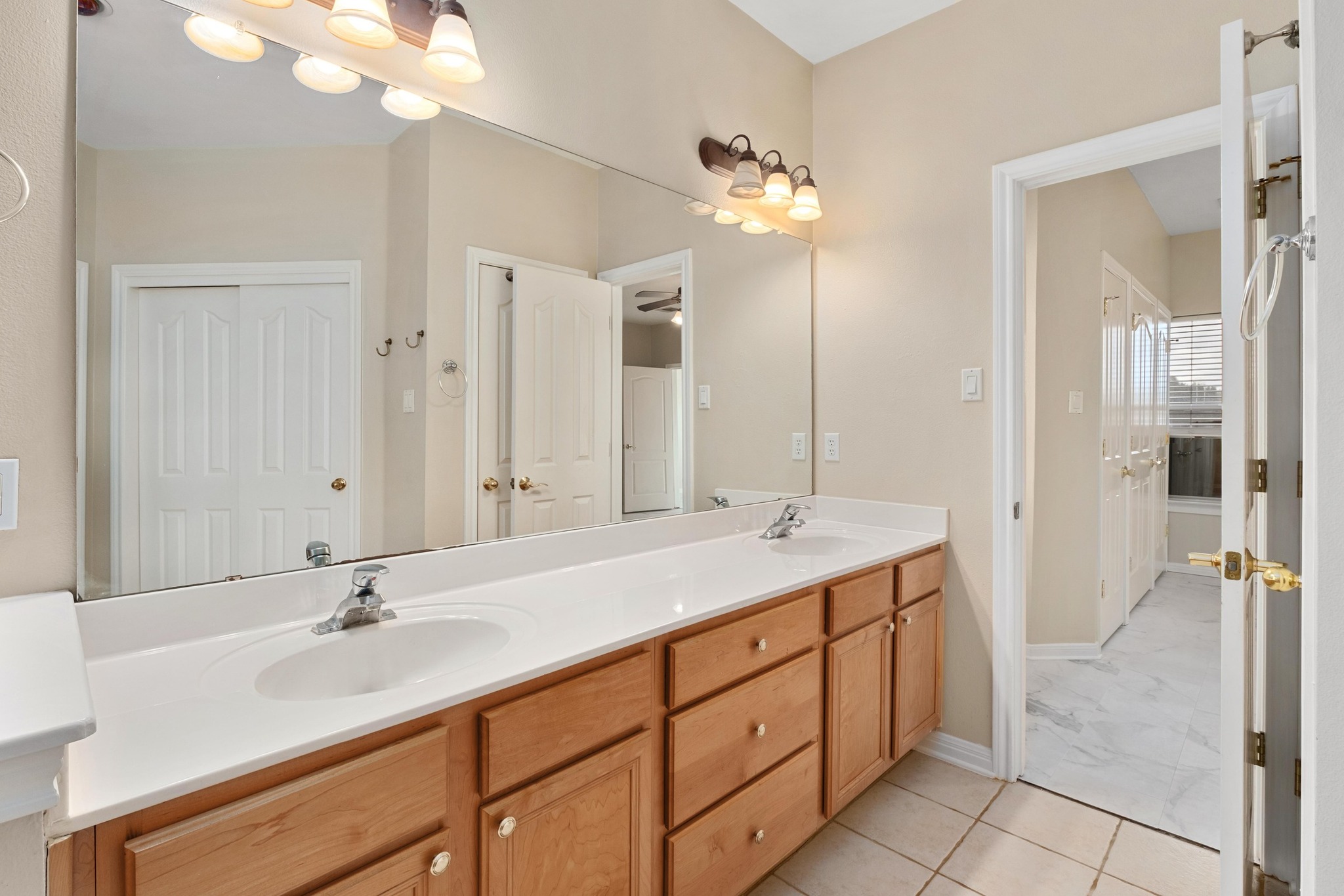 1021 Westland Ridge Road Dripping Springs, TX 78620 - Photo 17 of 33 Primary bath with double vanities
