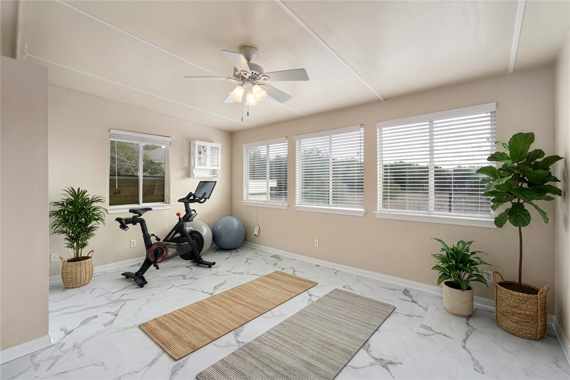 1021 Westland Ridge Road Dripping Springs, TX 78620 - Photo 19 of 33 Flex room off of the primary bedroom is great for workouts, second office, small den. Virtually staged.