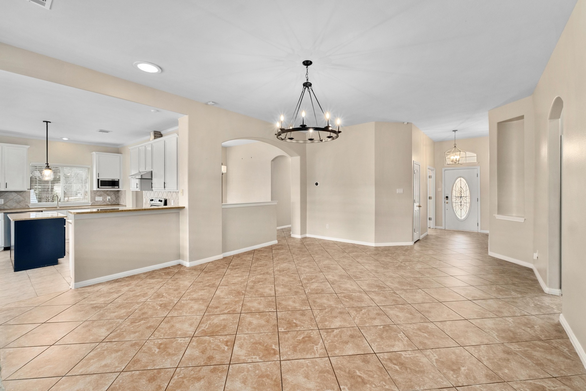 1021 Westland Ridge Road Dripping Springs, TX 78620 - Photo 26 of 33 Large living area open to dining room and kitchen