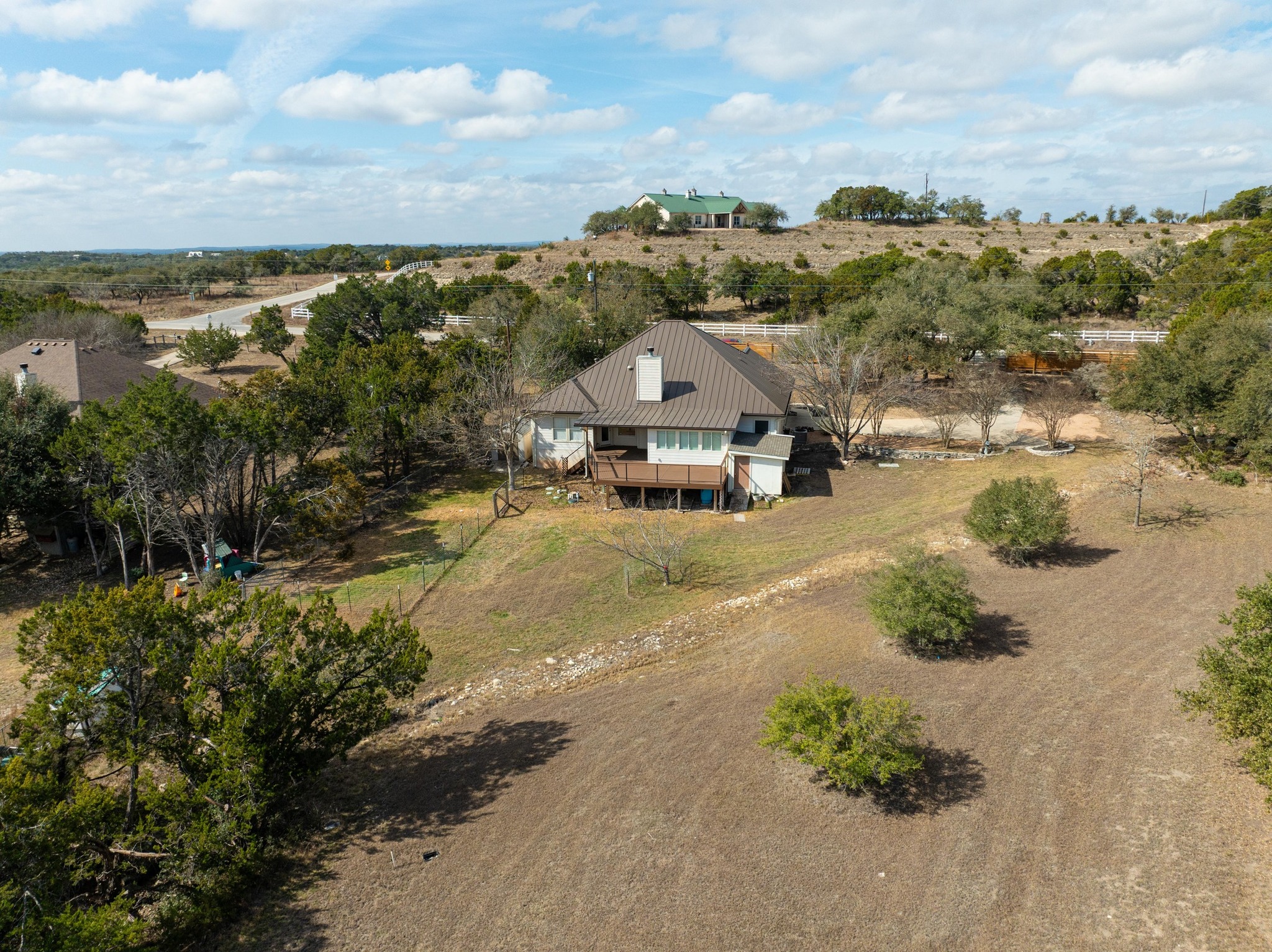 1021 Westland Ridge Road Dripping Springs, TX 78620 - Photo 3 of 33 The back view