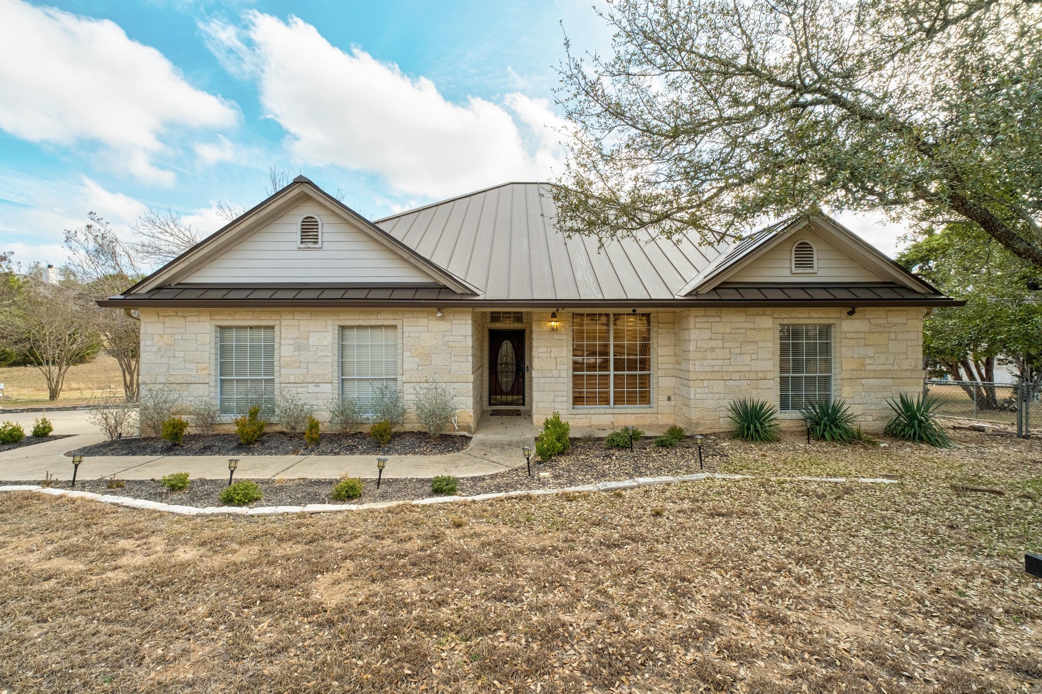 1021 Westland Ridge Road Dripping Springs, TX 78620 - Photo 8 of 33 Traditional home with Austin stone