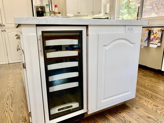 a view of outdoor kitchen with stainless steel appliances