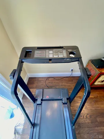 a view of outdoor space with deck and tree